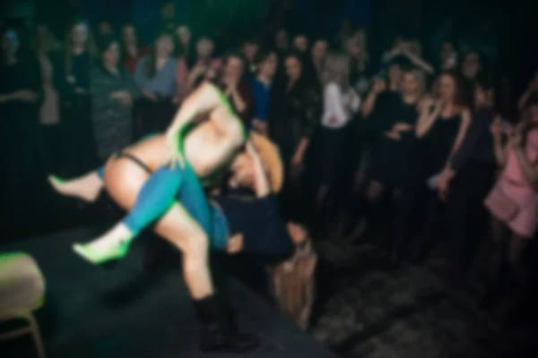 Do male strippers get turned on during a performance while interacting with female audience members?